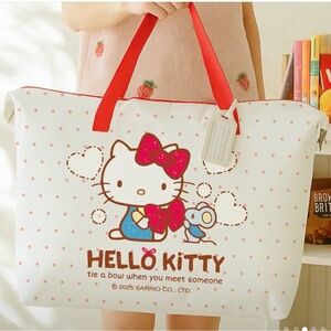 Sanrio Hello Kitty Pink and Red Bow storage bag with luggage tag NEW